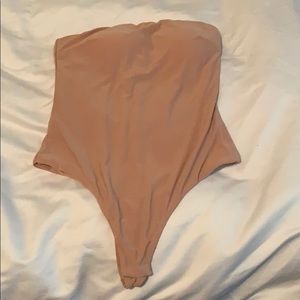 Nude sleeveless bodysuit